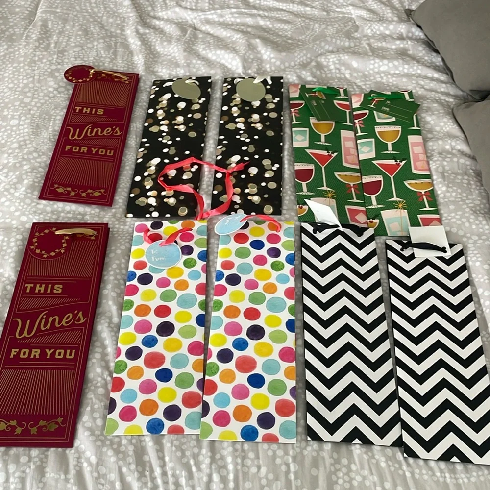 Set of 10 miscellaneous wine gift bags. Great for the upcoming holidays